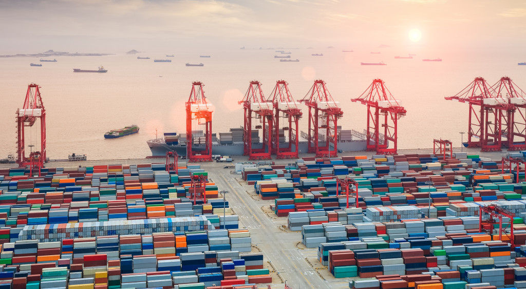 modern container terminal at dusk ,the busy logistics background